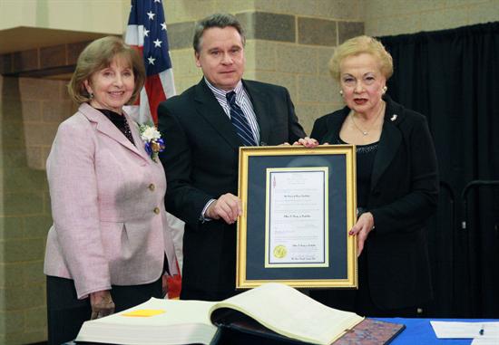 Monmouth County Clerk M. Claire French and Congressman Chris Smith issued the oath of office to Freeholder Lillian G. Burry at the county's 2012 Organization Day. 